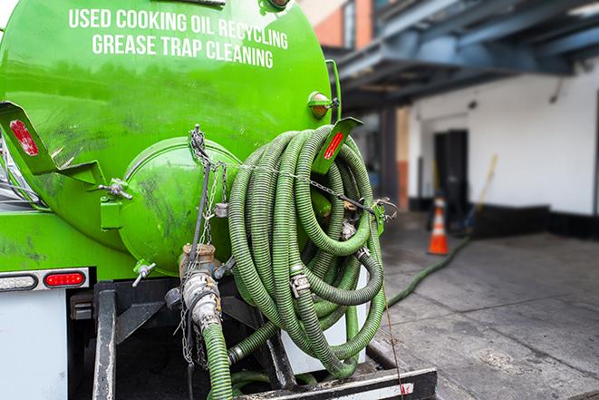 pumping out grease trap at commercial kitchen in Albany IL